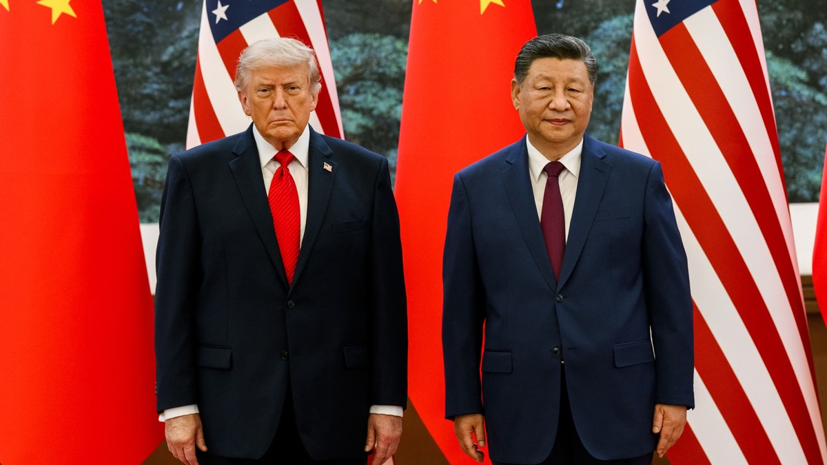 President Donald Trump and President Xi Jinping standing before US and Chinese flags