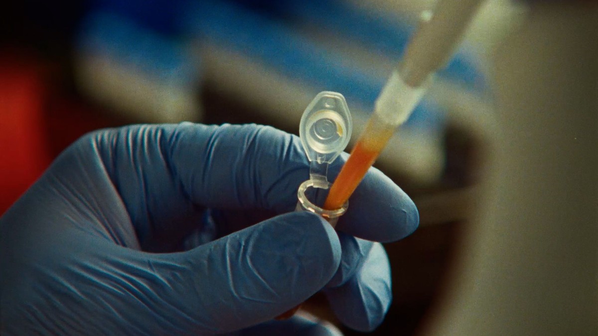 A scientist pipetting in a laboratory, from Anthropic's life-sciences announcement