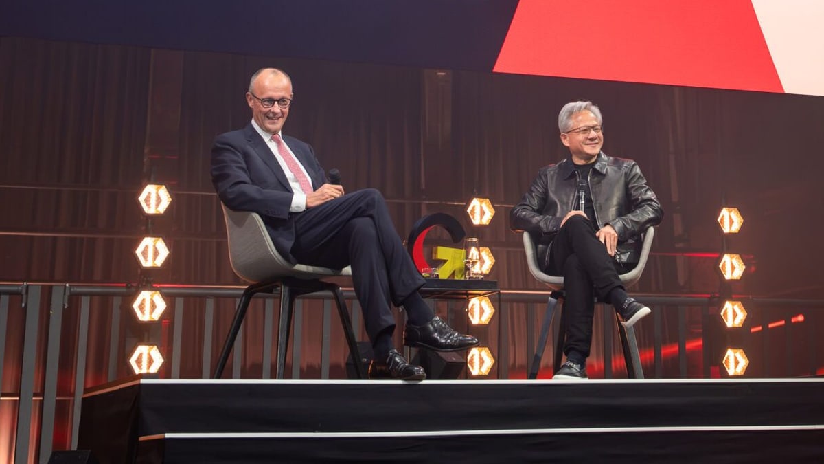 German Chancellor Friedrich Merz and NVIDIA chief executive Jensen Huang seated on stage at the Invest in Germany Summit in Berlin