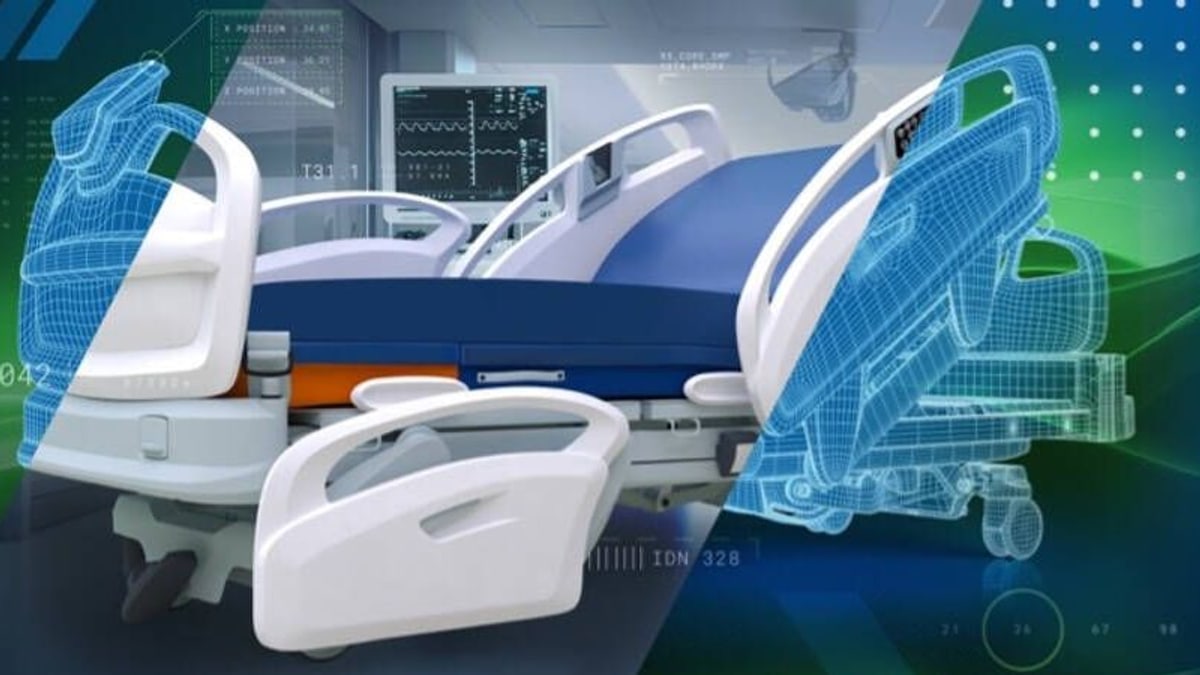 A hospital bed shown half as a finished product and half as a blue wireframe design model, from PTC's announcement of its Creo 13 design software