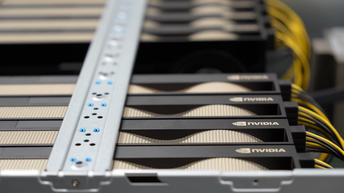 Nvidia graphics chips installed side by side inside a rack server, similar in kind to those in the case but not the servers in the case