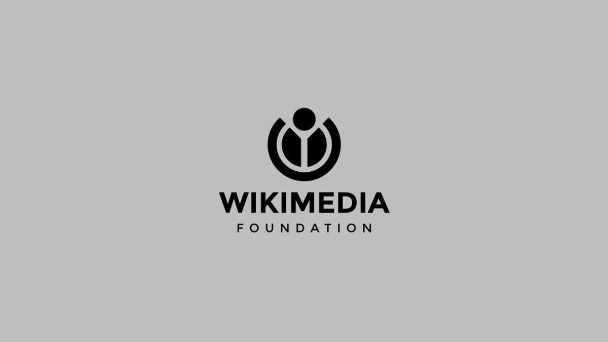 Wikimedia Foundation logo in black on a plain grey background